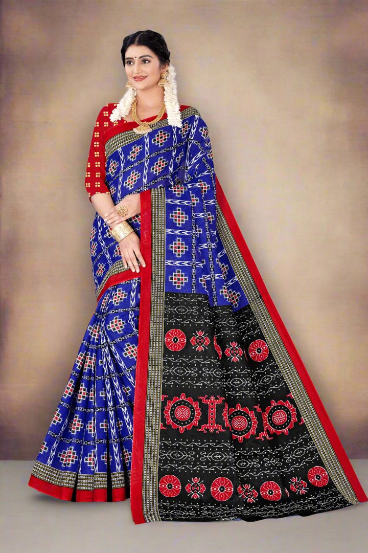 Classic blue batik print saree, perfect for Indian weddings and cultural occasions.