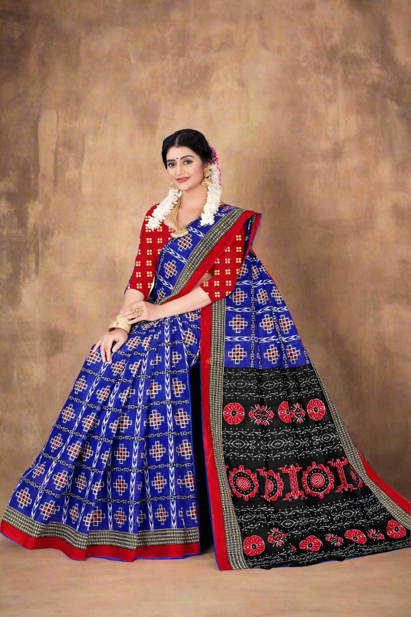 Traditional blue batik saree, ideal for festive celebrations and cultural events.