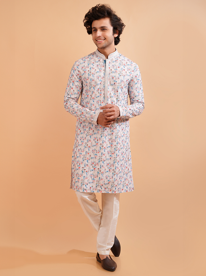 Elegant cream kurta pajama set for men, designed for Indian cultural and festive occasions.