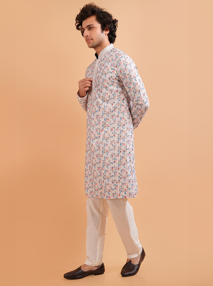 Stylish cream kurta pajama set for men, perfect for special occasions and traditional wear.