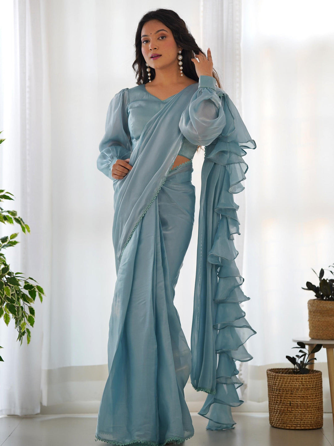 Blue luxurious fabric saree crafted for elegance and style.