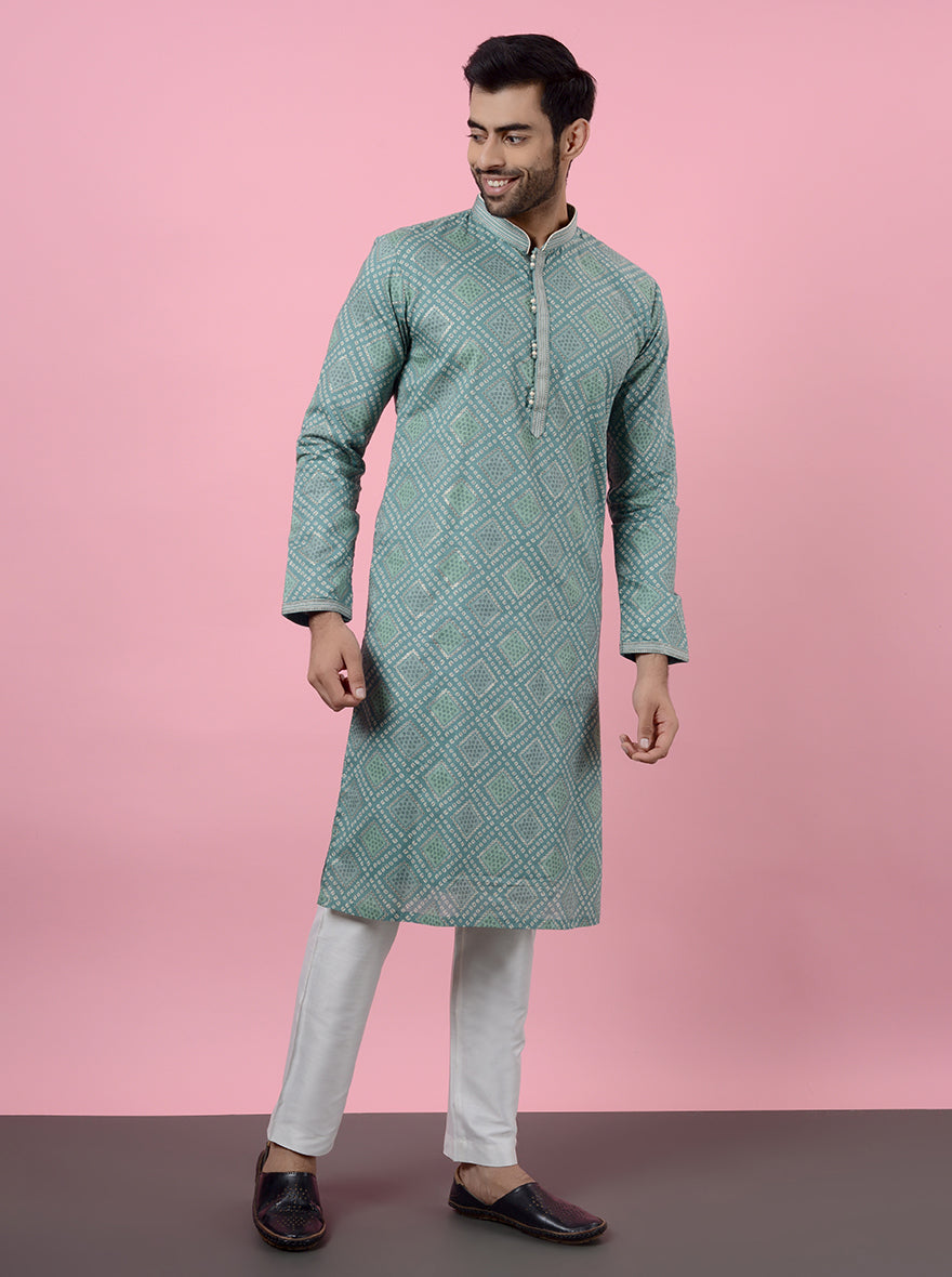 Luxurious mint green kurta pajama, embroidered and designed for USA mehndi and pooja events.