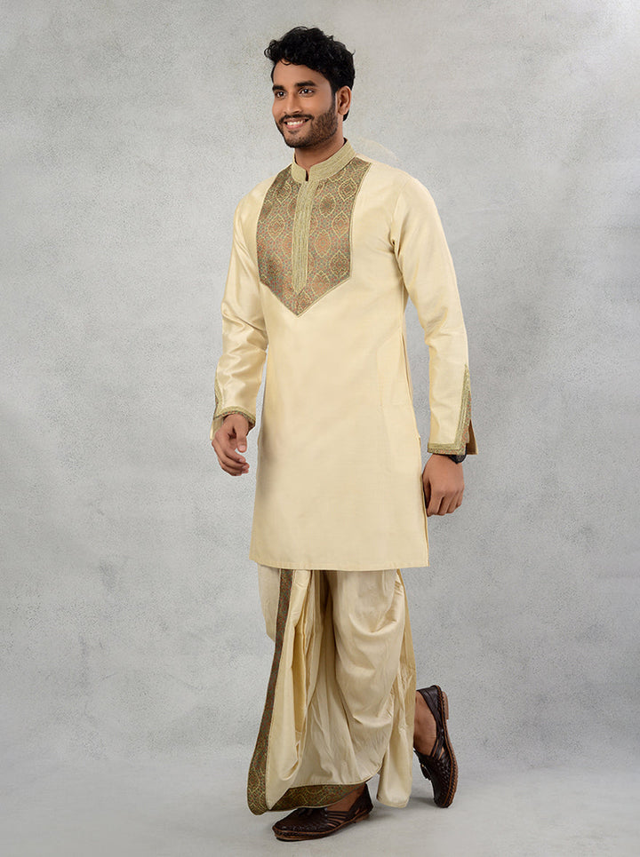 Elevate your ethnic style with this exquisite beige kurta and dhoti, crafted for sophisticated celebrations.