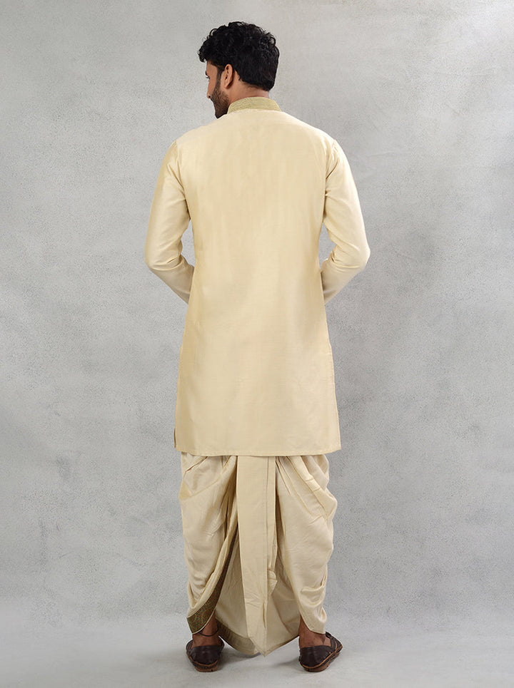 Make a statement in the USA with this refined beige kurta with dhoti, designed for weddings and festivities.