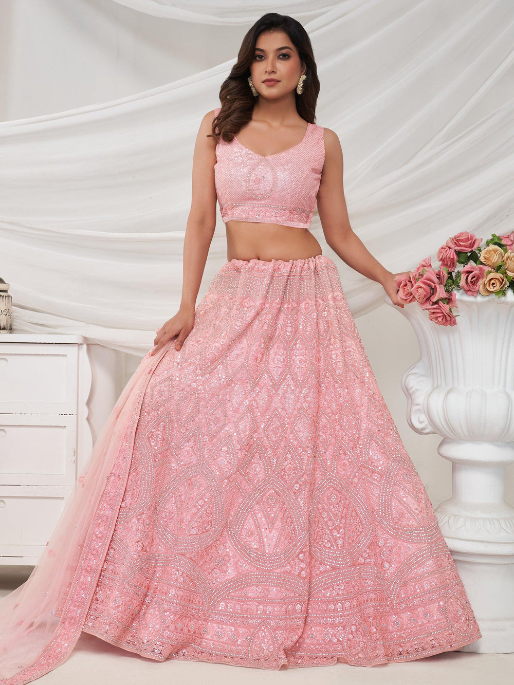 Glamorous Pink Embroidered Net Engagement Wear Lehenga Choli