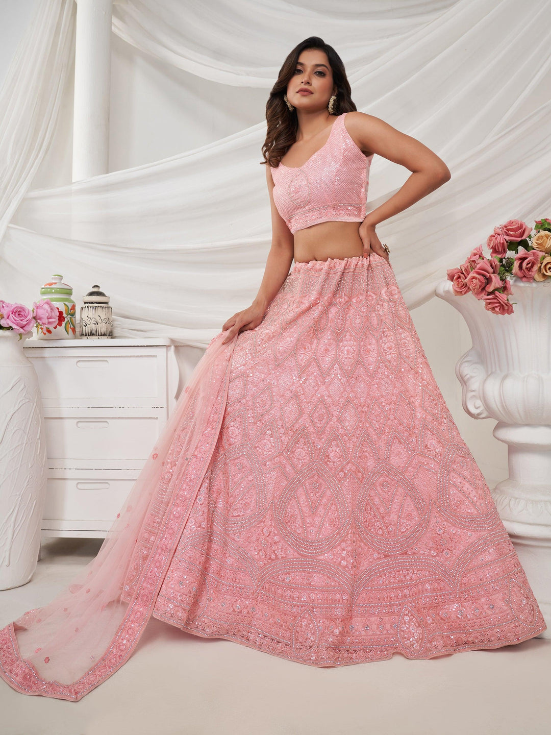 Glamorous Pink Embroidered Net Engagement Wear Lehenga Choli