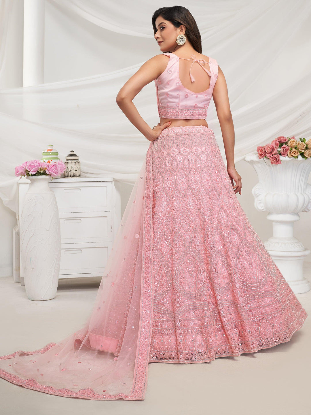 Glamorous Pink Embroidered Net Engagement Wear Lehenga Choli