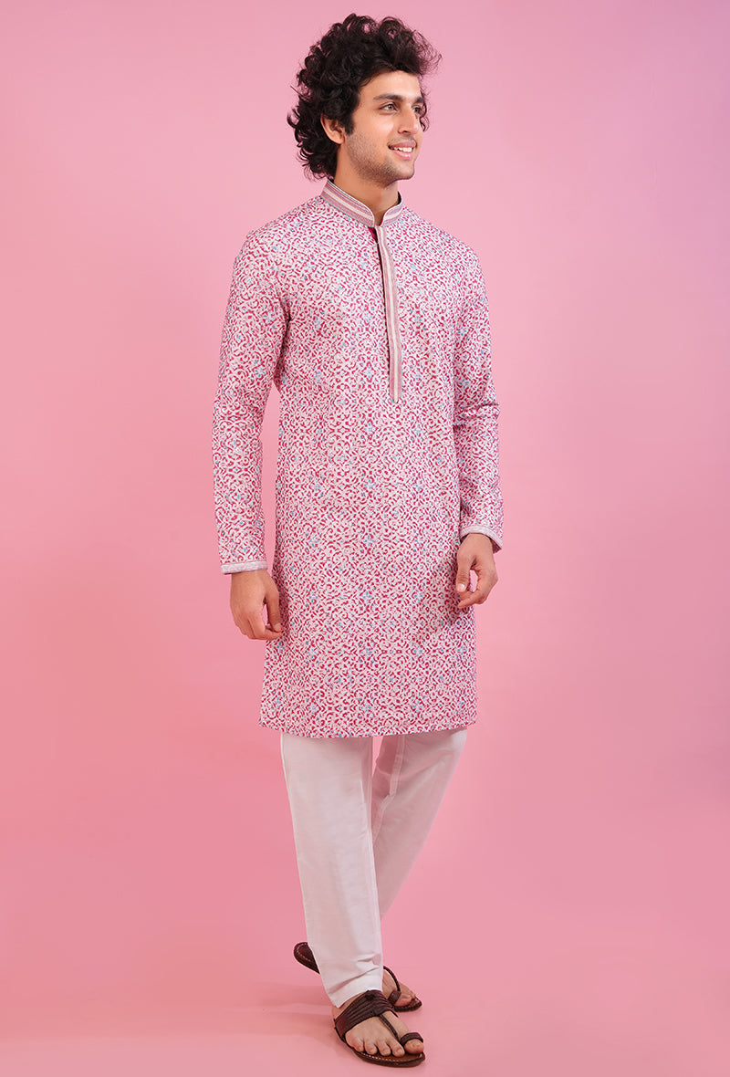 Premium maroon kurta pajama set for men, designed with detailed embroidery for festive wear.