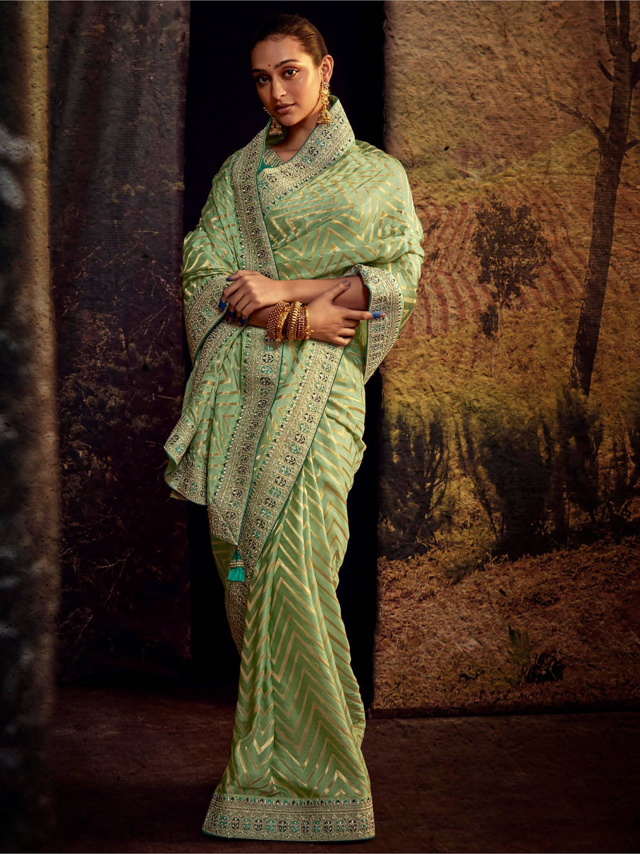 Green silk saree crafted for elegance and style.