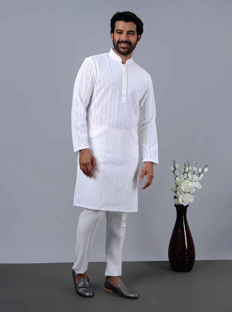 Stylish white kurta pajama for men, perfect for festive gatherings.