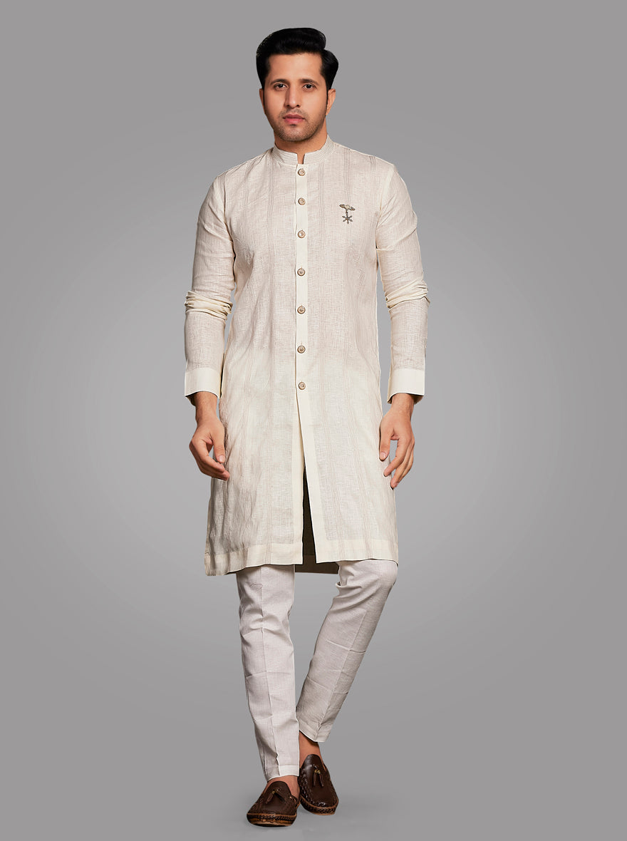 Elevate your casual wardrobe with our cream solid kurta set, designed for modern men.