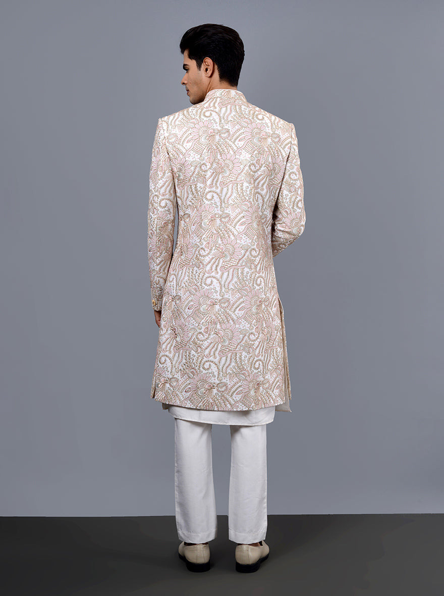 High-quality off-white and pink sherwani, crafted with intricate embroidery for your special day.