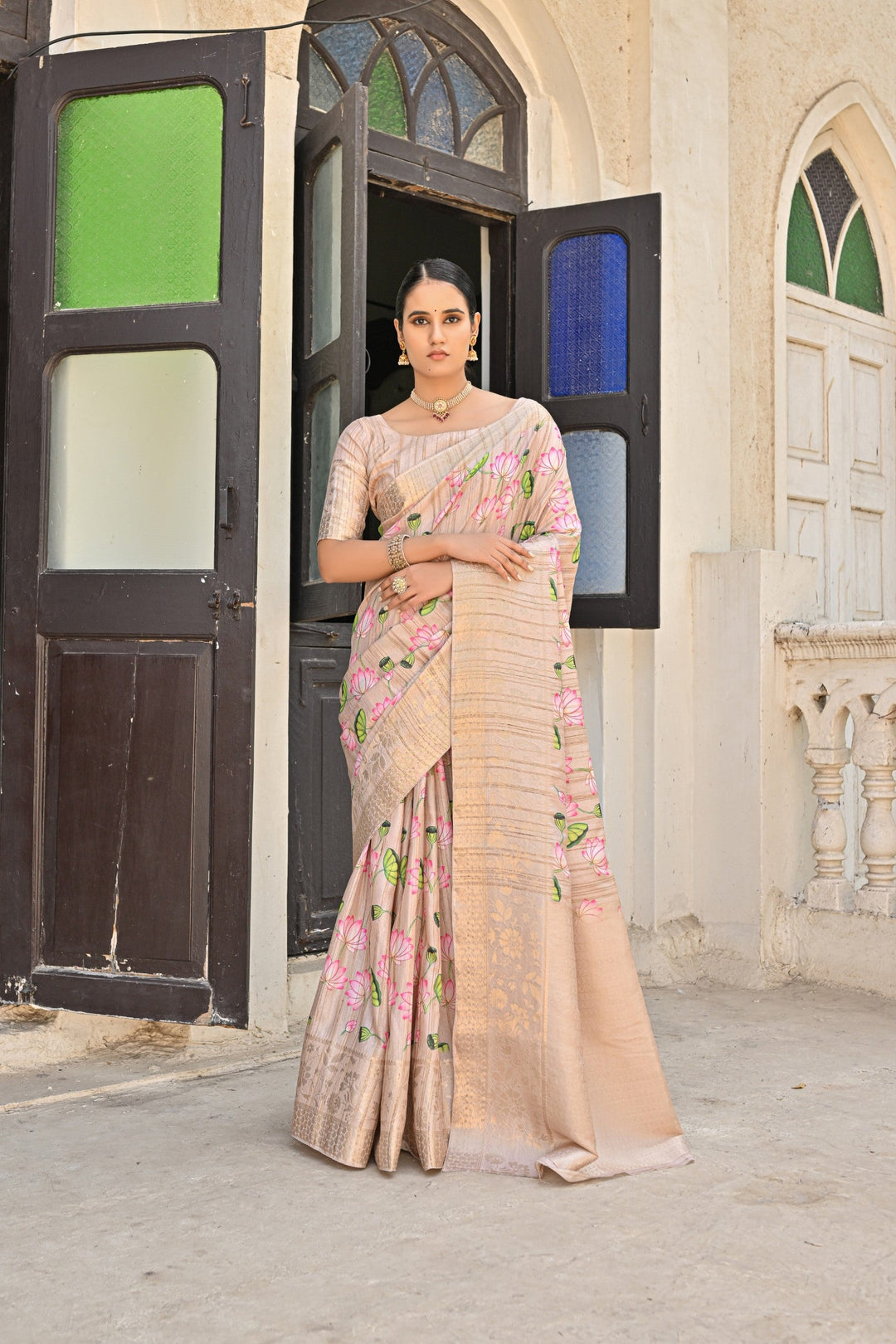 Soft peach cotton silk saree with intricate zari woven pallu for a luxurious, elegant look in the USA.