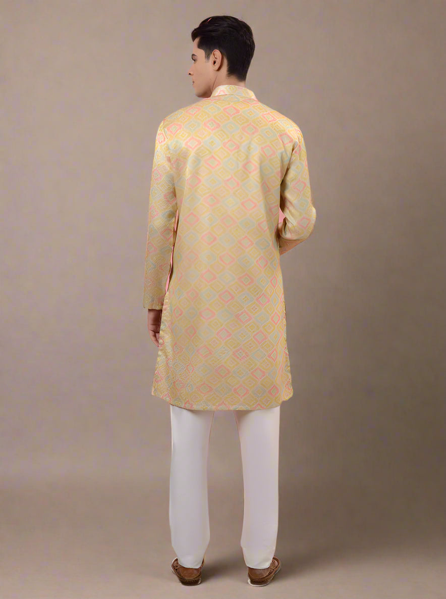 Celebrate in style with our cream & yellow kurta pajama for men, designed for festive occasions.