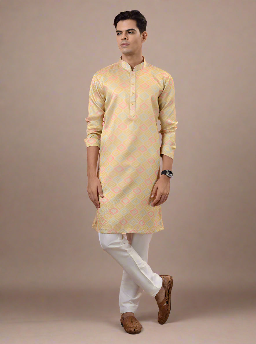 Elegant cream & yellow kurta pajama for men, adding refinement to your festive wardrobe.