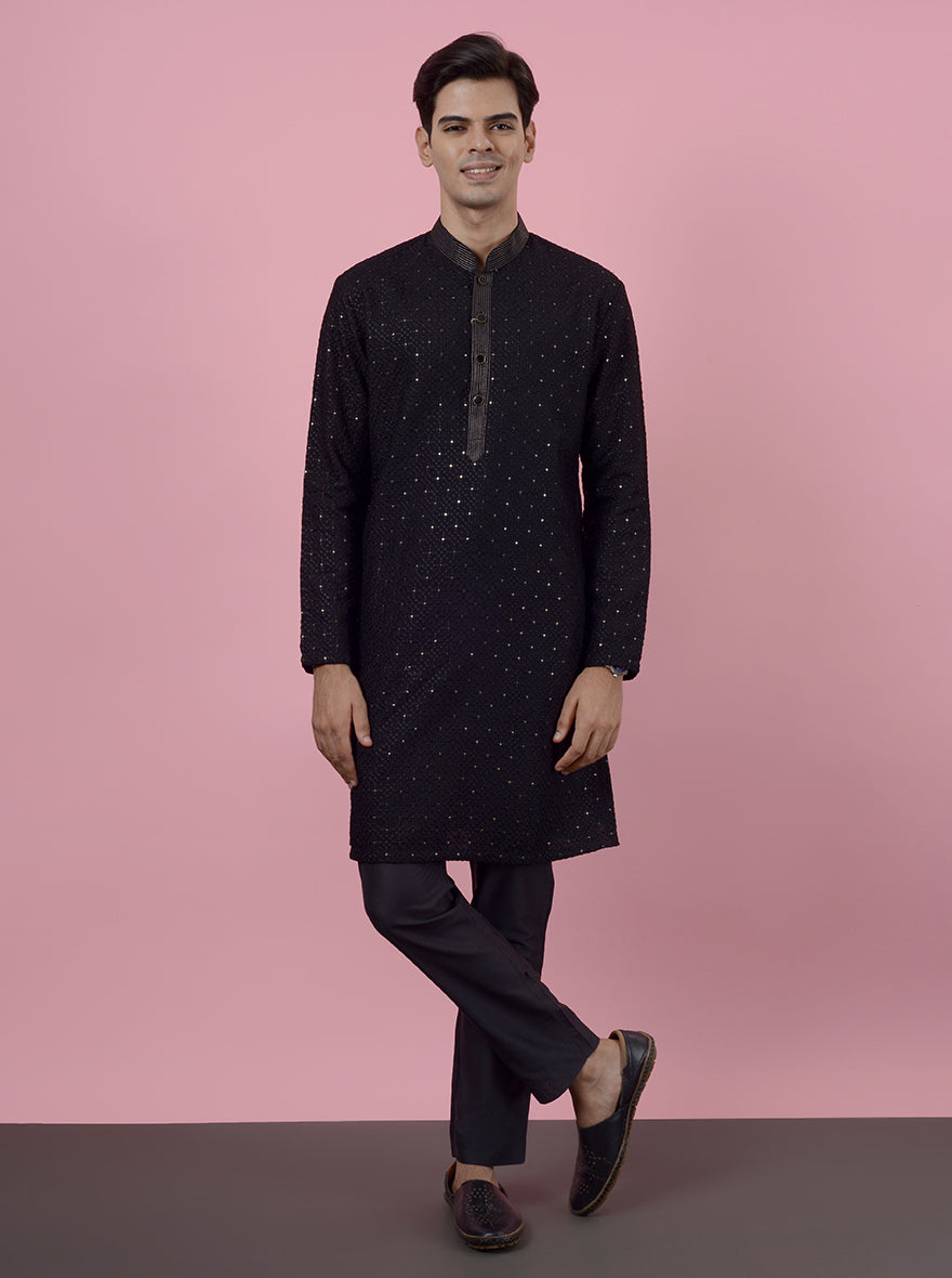 Black silk blend kurta pajama for USA sangeet, featuring elegant embroidery.