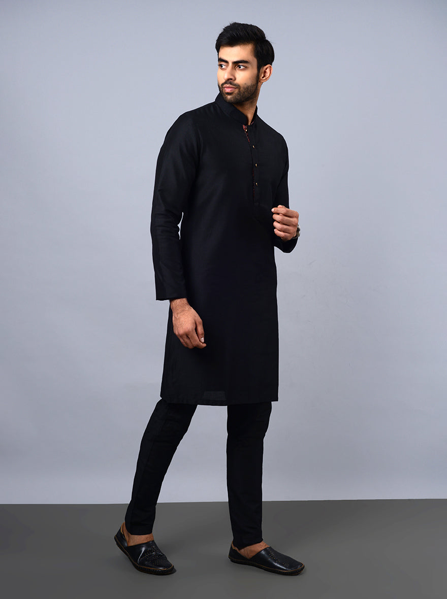 Comfortable black kurta pajama, making a statement at any event.