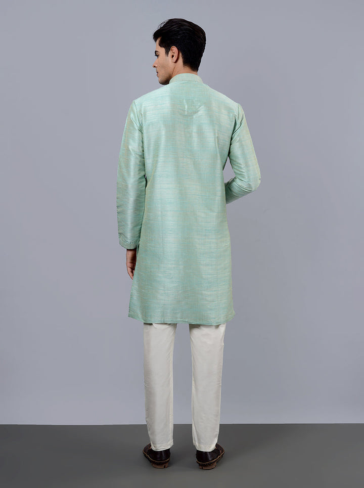 Versatile mint green kurta pajama, ideal for formal and casual events.