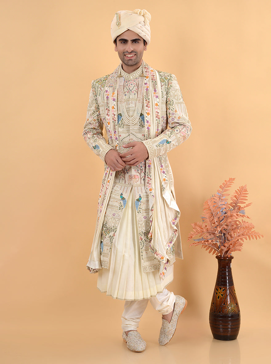 This elegantly crafted Beige Silk Embroidered Sherwani offers a stunning combination of traditional and contemporary design elements, perfect for grooms in the USA seeking a sophisticated look.