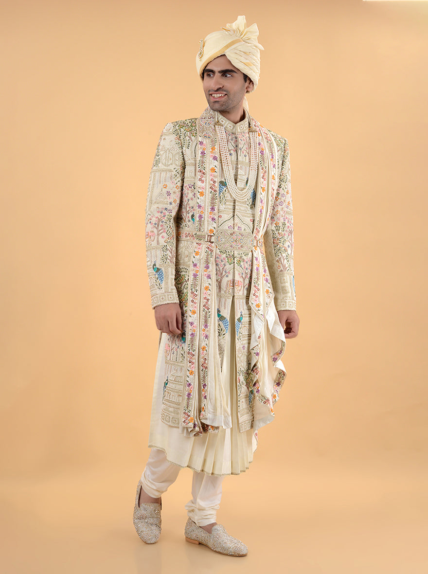 Embrace elegance with this Beige Silk Embroidered Sherwani, featuring intricate details that marry tradition with modern flair, ideal for grooms making a statement in the USA