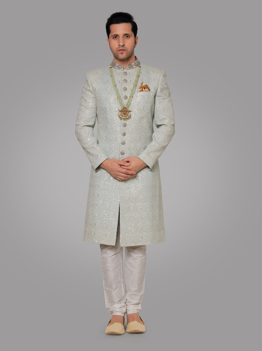 Shop this Mint Green Sherwani for a refined and comfortable wedding ensemble, ideal for modern grooms.