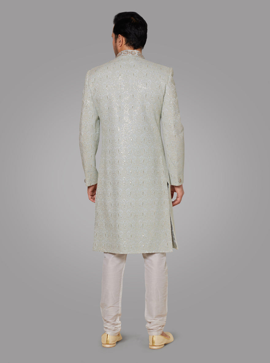 Step into elegance with this Mint Green Sherwani, designed for a sophisticated wedding look in the USA.