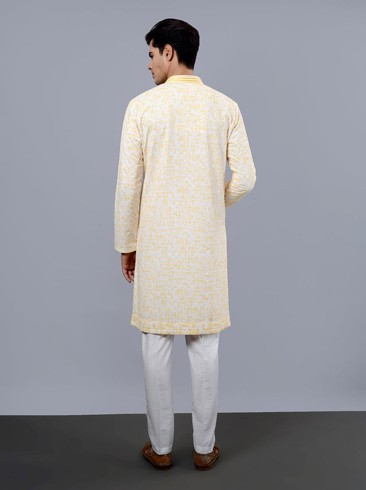 Unique cream and yellow kurta, designed for various occasions.