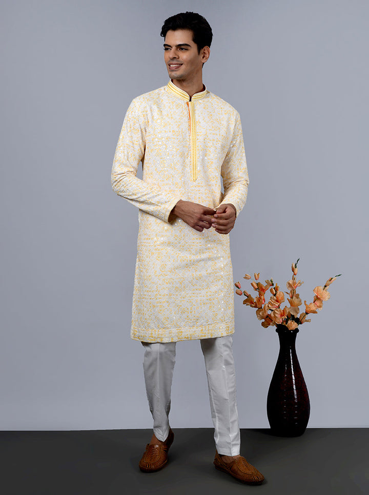 Elegant cream and yellow kurta, ensuring you shine at every gathering.