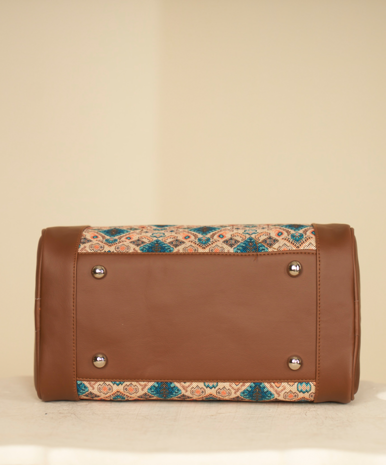 Elegant Brown Leather and Fabric Handbag with Geometric Pattern