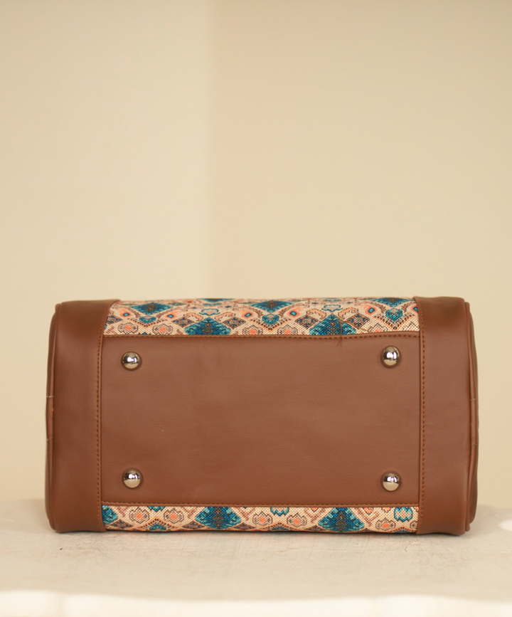 Elegant Brown Leather and Fabric Handbag with Geometric Pattern