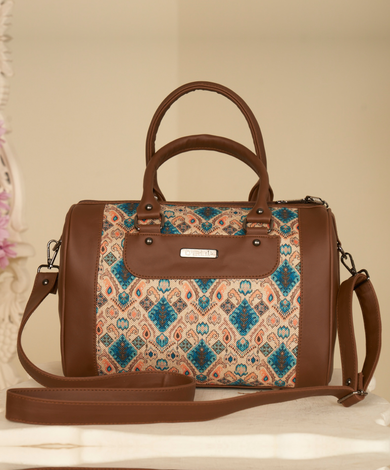 Elegant Brown Leather and Fabric Handbag with Geometric Pattern