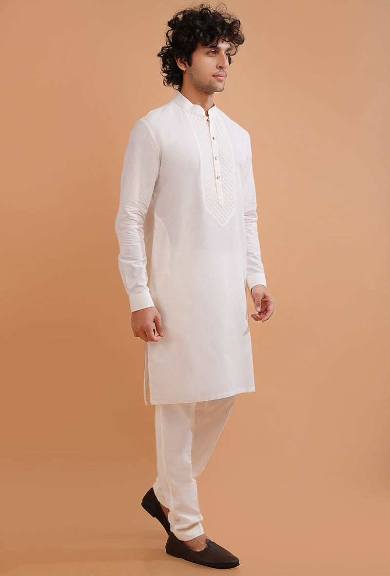 White kurta pajama for men, crafted from cotton, ideal for daily wear and special occasions.