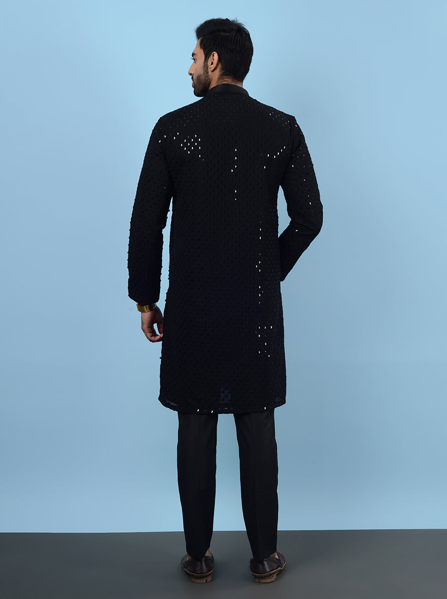 Unique embroidery enhances this black georgette kurta pajama, ensuring you stand out.