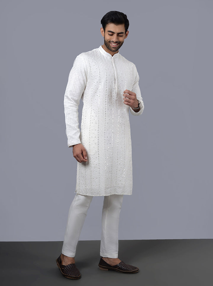 Unique off-white kurta pajama, designed for special gatherings and events.