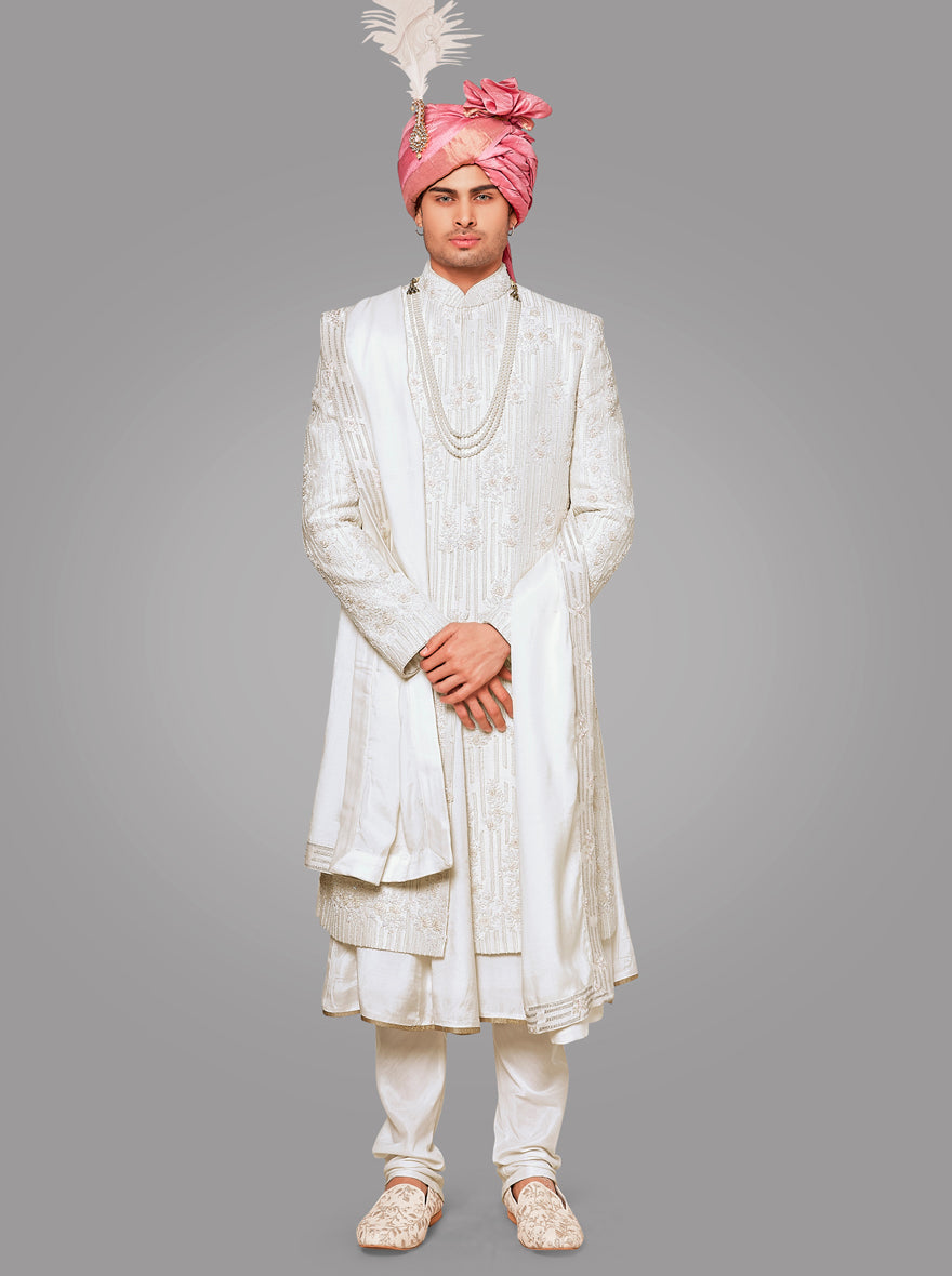 Look regal at weddings in the USA with this cream silk blend sherwani designed for modern grooms.