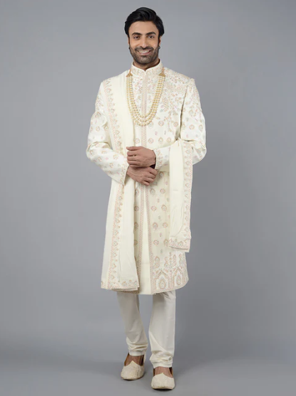 Elevate your ethnic wear with this embroidered cream sherwani, crafted for style and elegance.