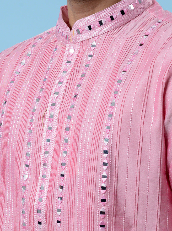 Premium pink kurta pajama set for men, featuring mirror and thread embroidery on Chanderi silk.