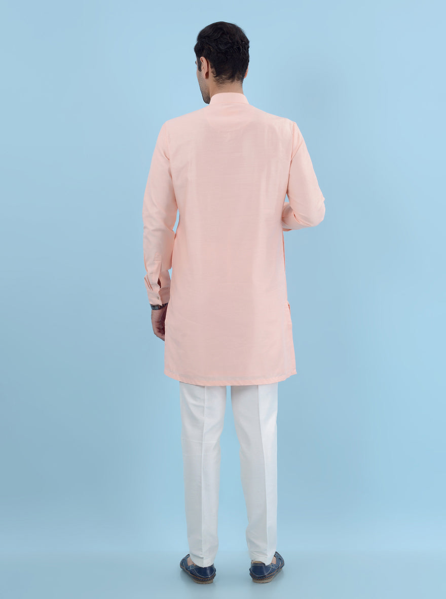 Men's regular fit peach kurta pajama made from silk blend for elegant ethnic attire.