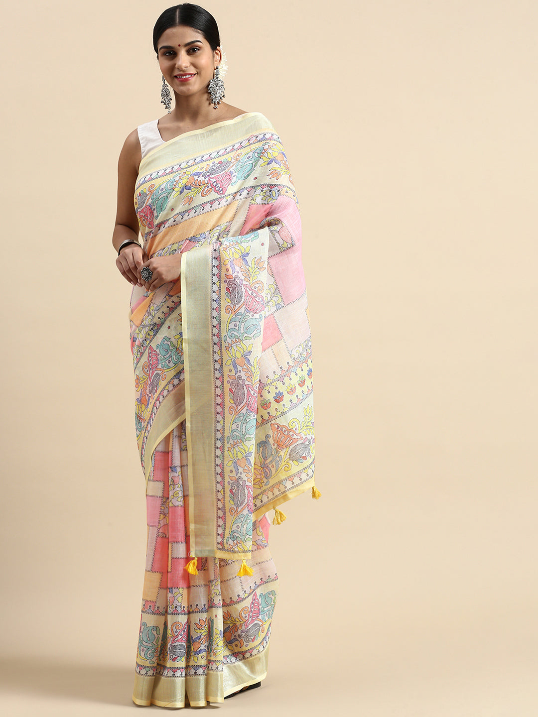 Soft linen saree adorned with floral pattern and Kantha lotus border