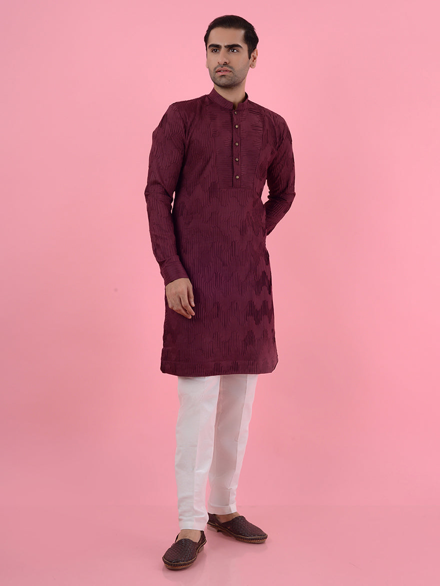 Discover the charm of this silk blend kurta pajama, designed to impress at every gathering.