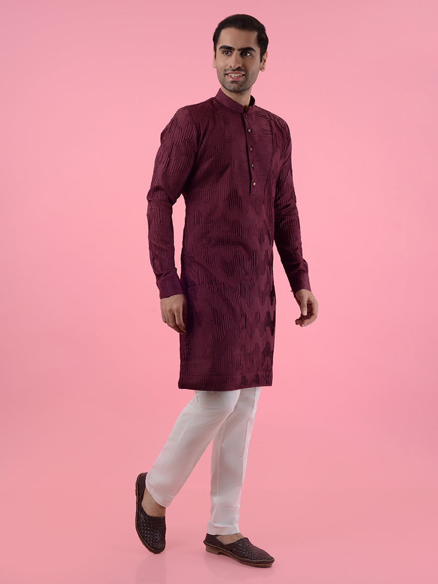 Silk blend wine kurta pajama for men, embroidered for stylish traditional wear.