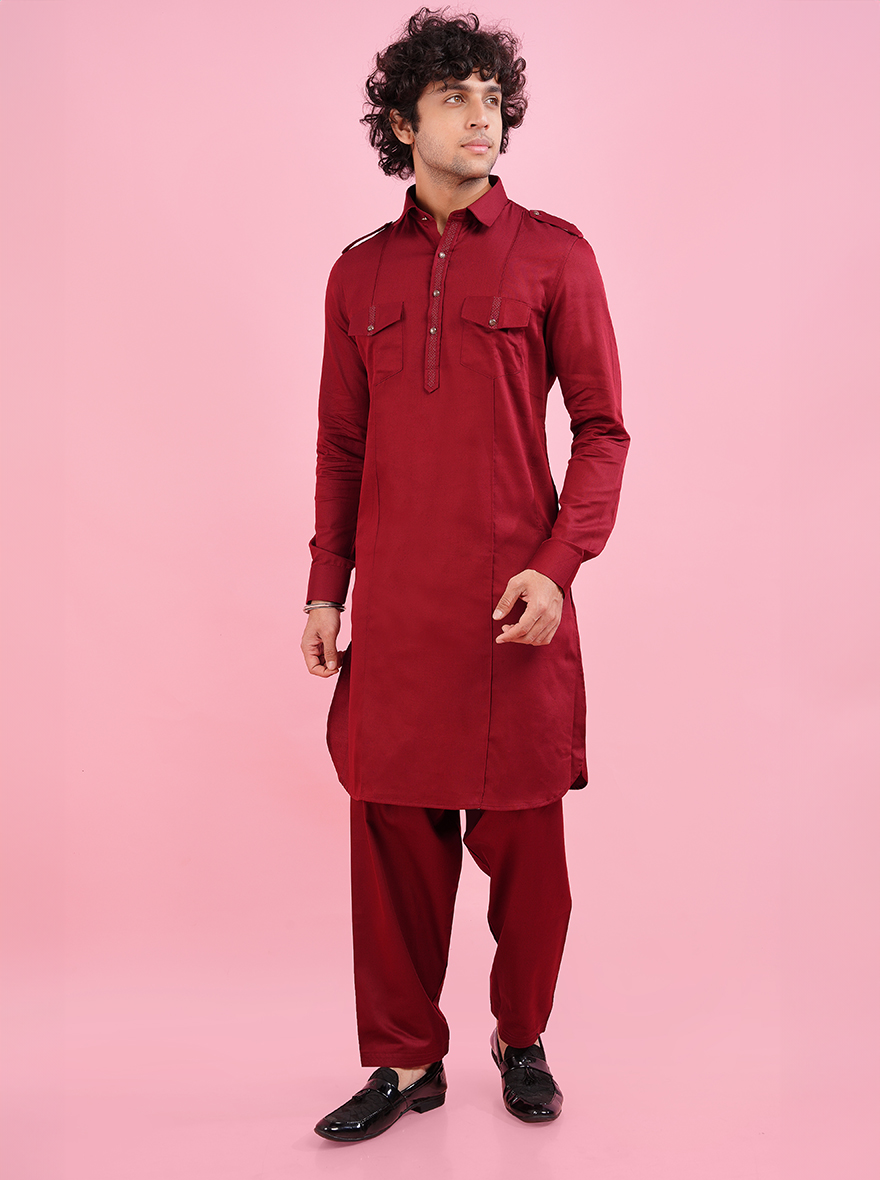 Make a lasting impression at any event with this maroon Pathani kurta, designed with intricate thread work and a regular fit, ideal for festive occasions.