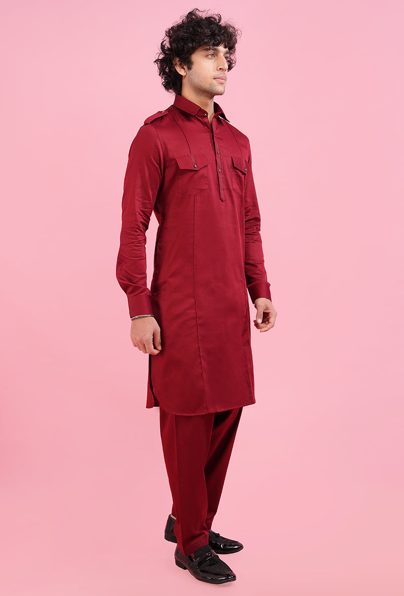 Experience elegance in this maroon Pathani kurta, crafted from silk blend fabric with intricate thread work, making it an ideal choice for weddings and cultural festivities.