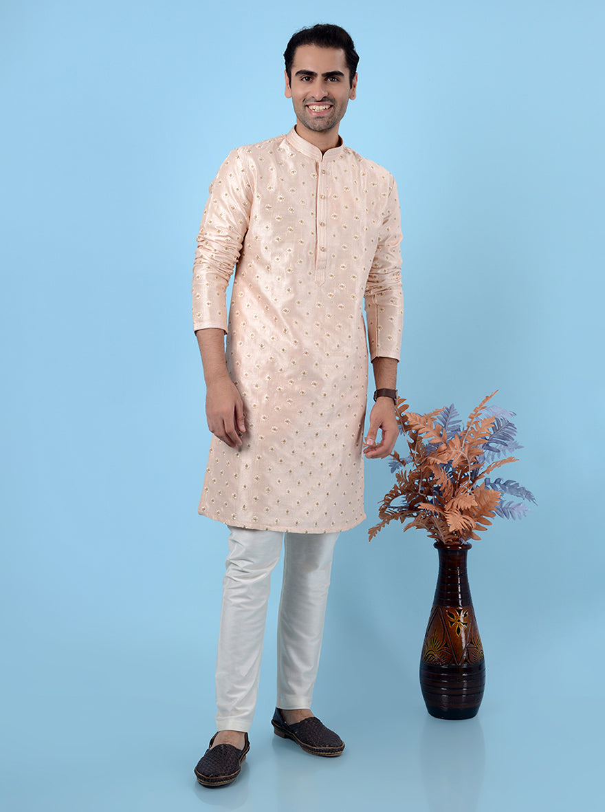 Stylish peach kurta set for men, crafted from silk blend fabric.