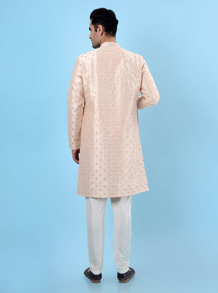 Exquisite peach silk blend kurta pajama set for men, ideal for festive and cultural events.