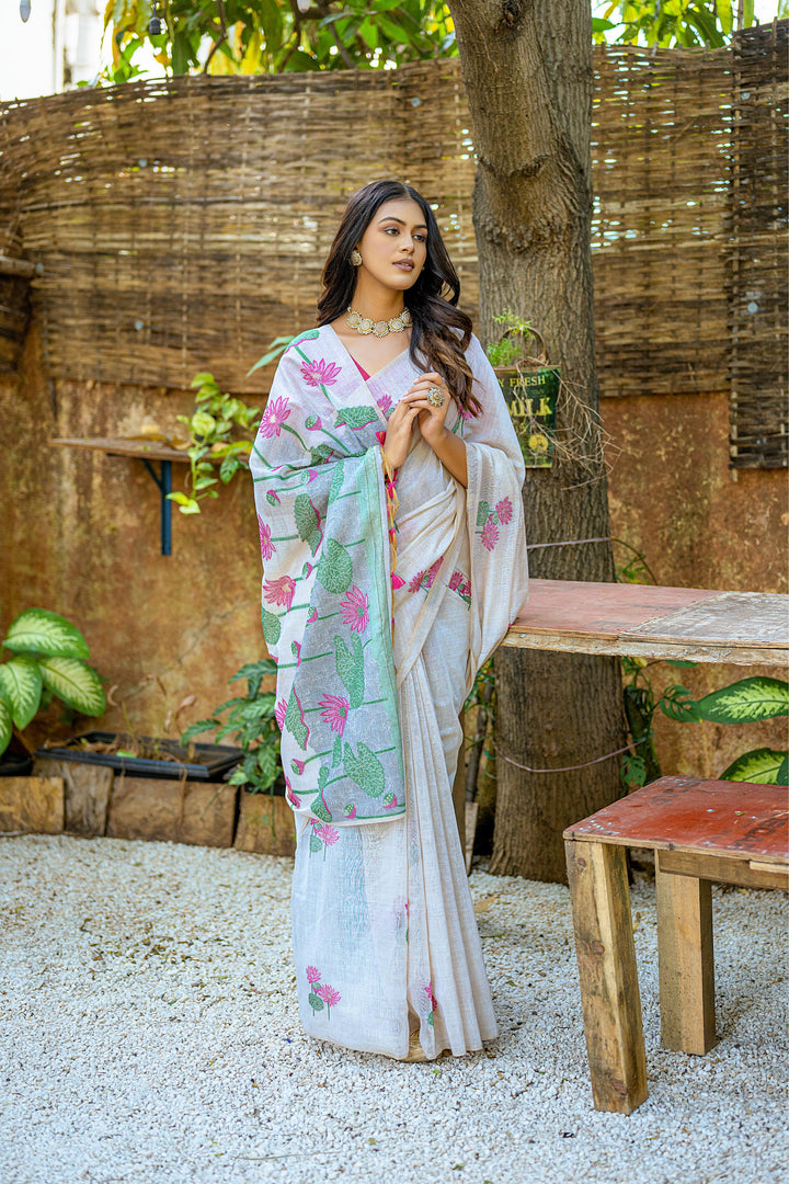 Elegant Muga silk saree with floral weaving and classic tassel pallu