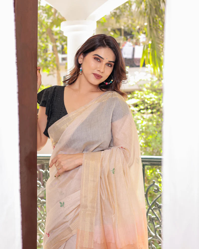 Classic green Muga cotton saree featuring fine zari weaving, perfect for traditional occasions and celebrations.