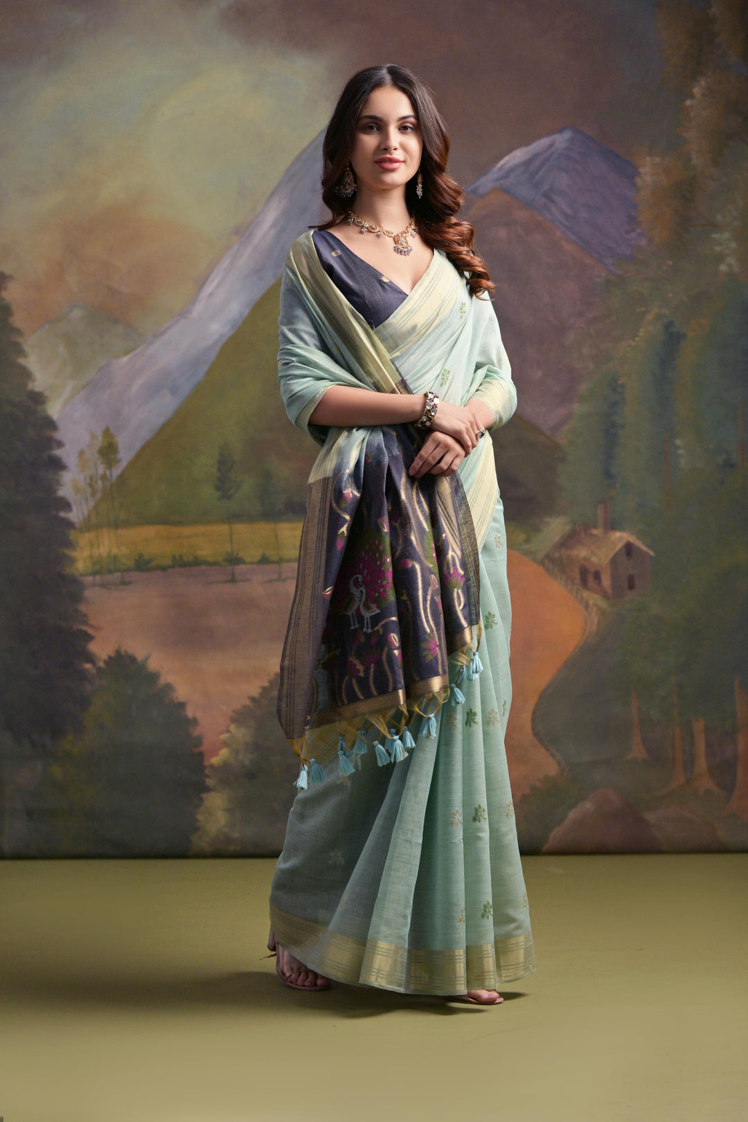 Traditional sea green Muga silk saree, ideal for Indian weddings and cultural ceremonies.