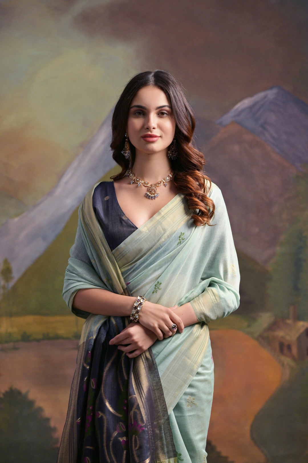 Soft sea green Muga silk saree with intricate Resham detailing, perfect for grand occasions.