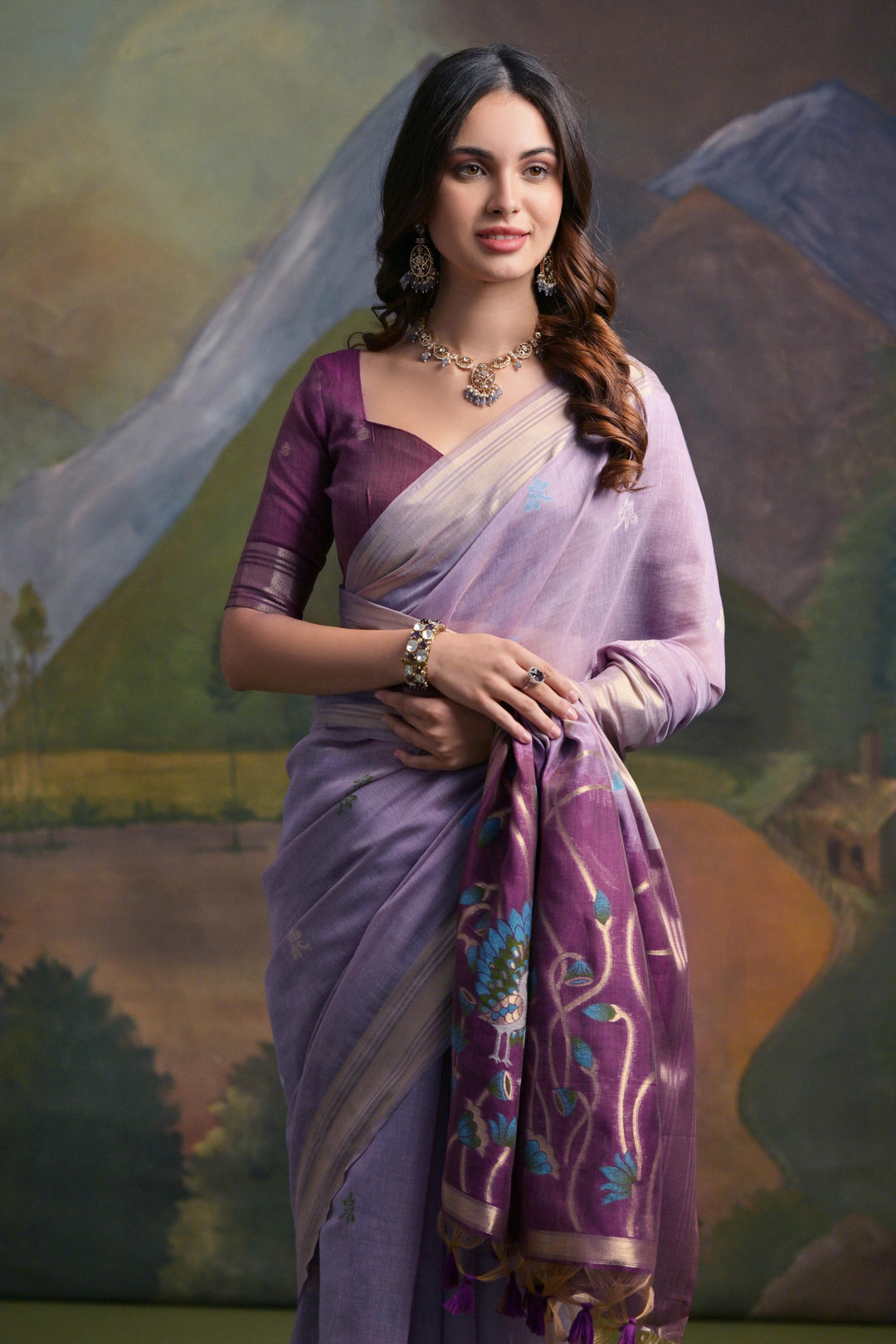 Elegant purple Muga silk saree, featuring intricate Resham work for a sophisticated look.